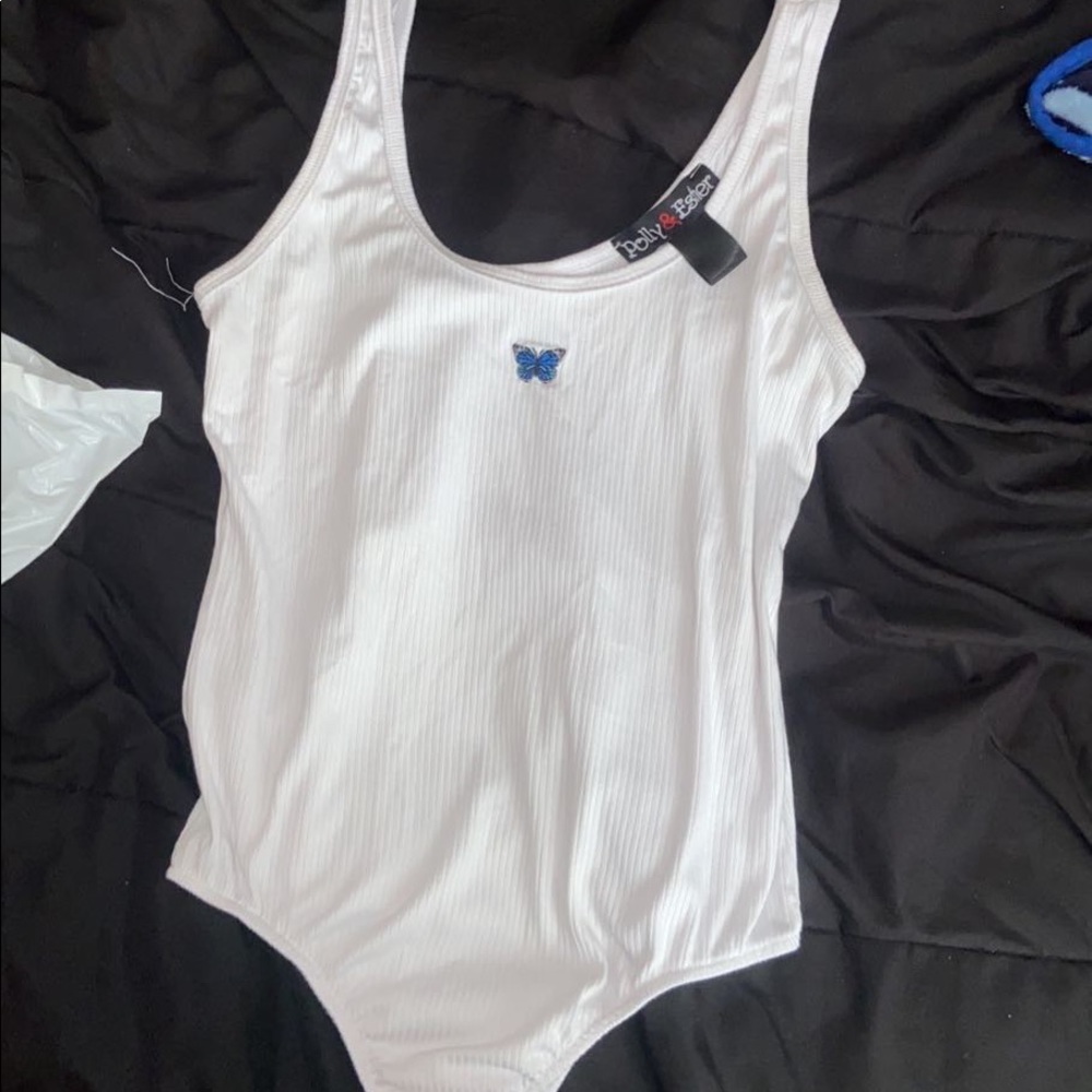 white butterfly bodysuit, never worn, doesn’t snap at bottom